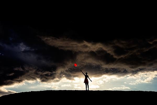 Photograph Tyler Shields  Red Balloon on One Eyeland